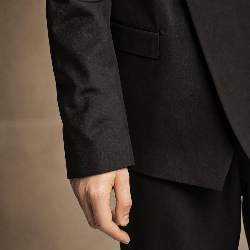 Black Asymmetric-Wrap Structured Blazer — fabric close-up
