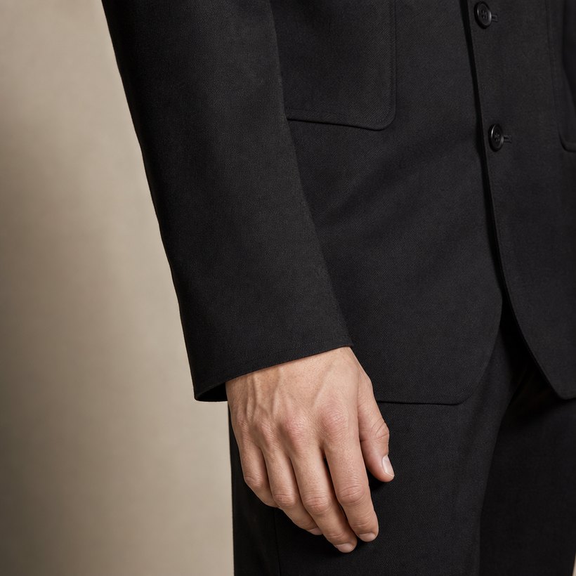 Black Collarless Four-Button Slim Suit — fabric close-up