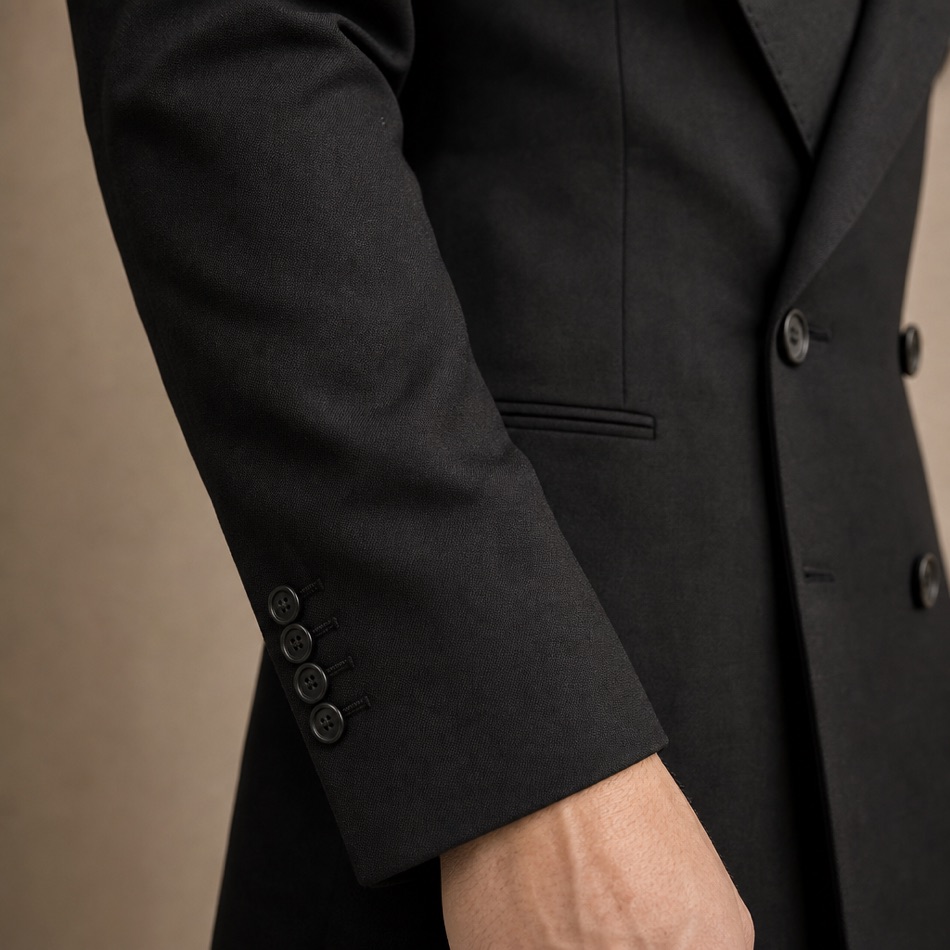 Black Double-Breasted Peak-Lapel Suit — fabric close-up