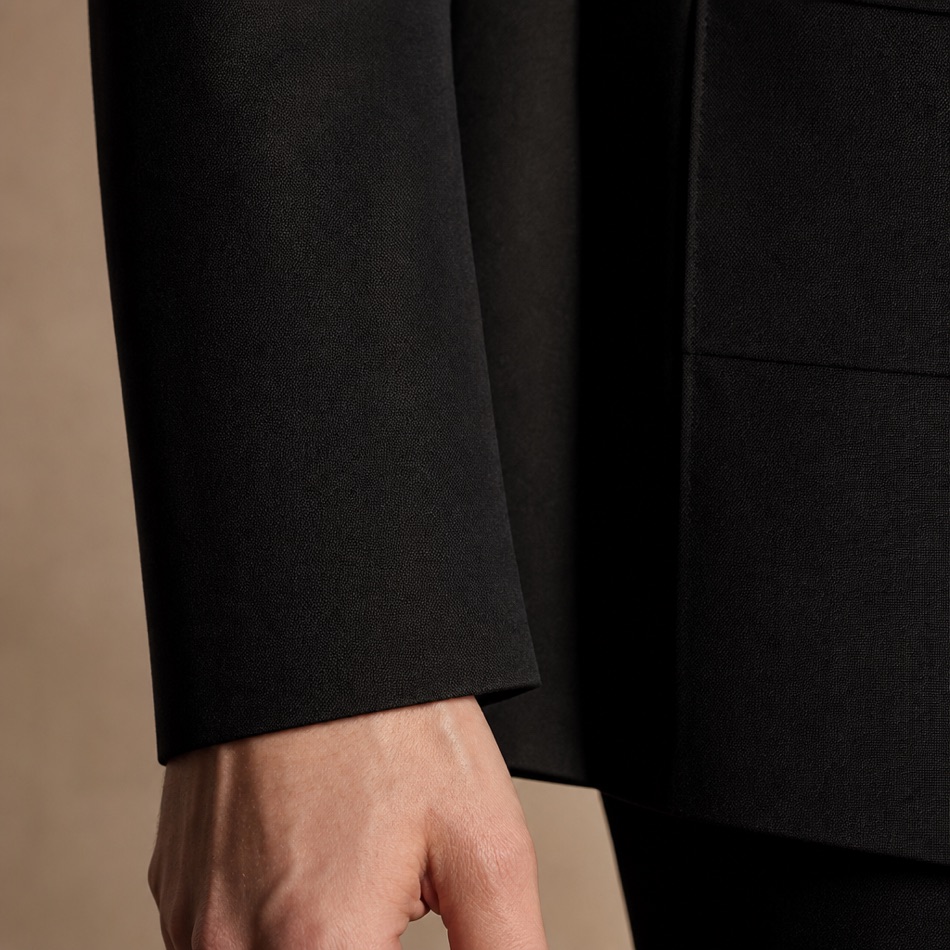 Black Peak-Lapel Wool Suit — fabric close-up