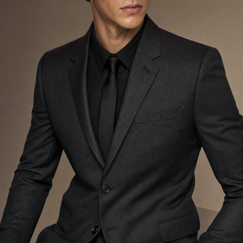 Elongated Charcoal Suit — lapel and collar detail